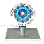 Killerbody KB20104 Iron Man Arc Reactor wireless charger — Front view of the illuminated reactor and stand